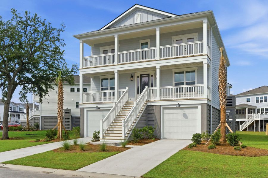 Front exterior of a new home in Liberty Hill Farm, Mount Pleasant, SC, highlighting curb appeal (Image 24).