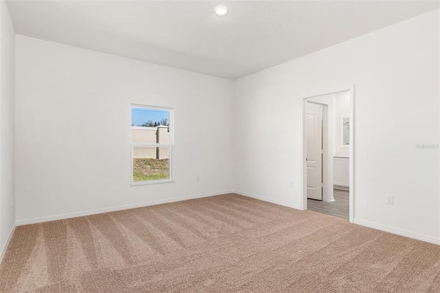 Spacious, unfurnished interior of a new home in Peach Crossings, Winter Haven (Image 15).