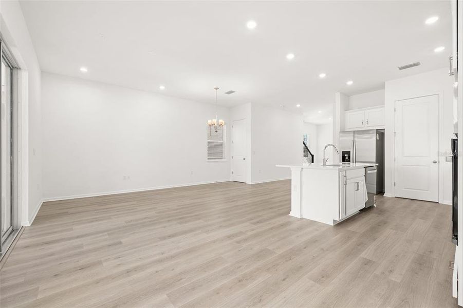 Spacious, unfurnished interior of a new home in Serenade at Ovation, Winter Garden (Image 16).