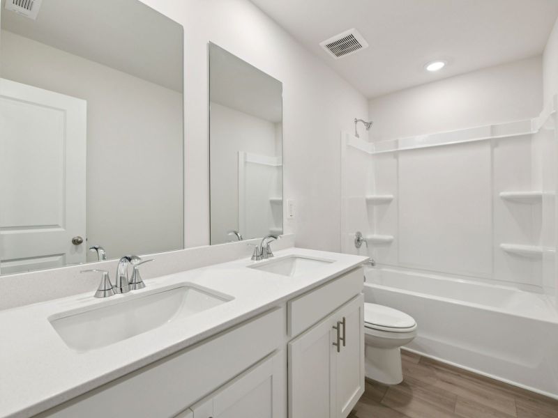 Furnished interior view inside a new home in Harmony Manor, Fairburn (Image 13).