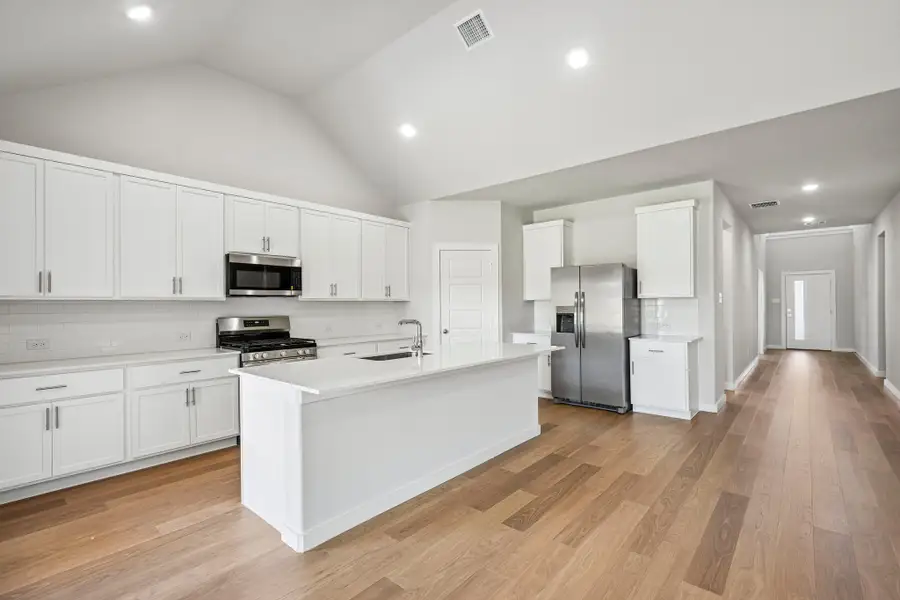 Kitchen in the Wimbledon home plan by Trophy Signature Homes