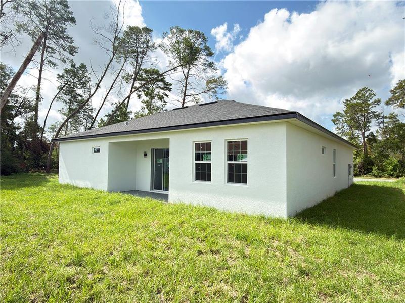 Exterior details and patio area of a home in , Ocala (Image 28).