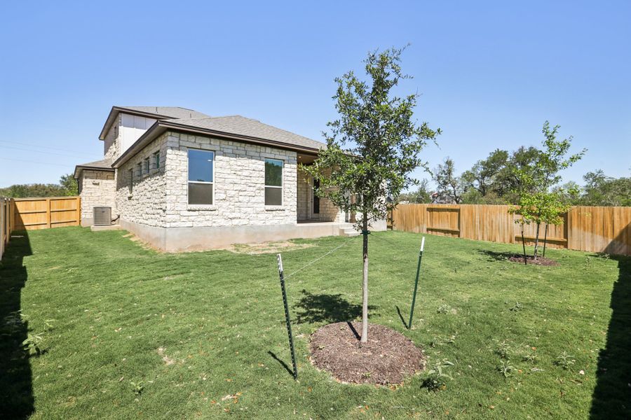 Exterior details and patio area of a home in Persimmon, Buda (Image 16).