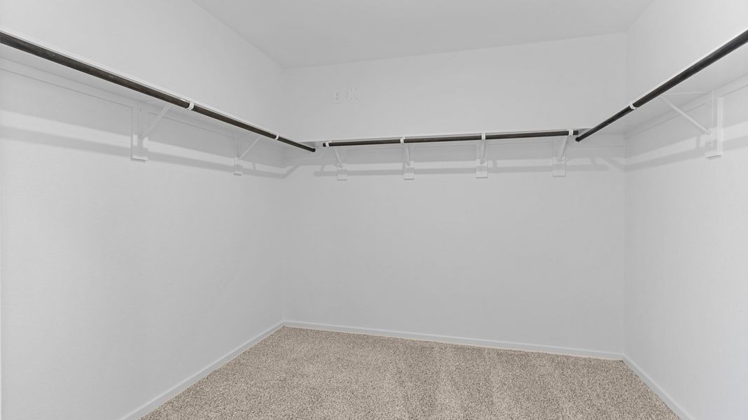 Spacious, unfurnished interior of a new home in Caldwell Crossing, Iowa Colony (Image 16).