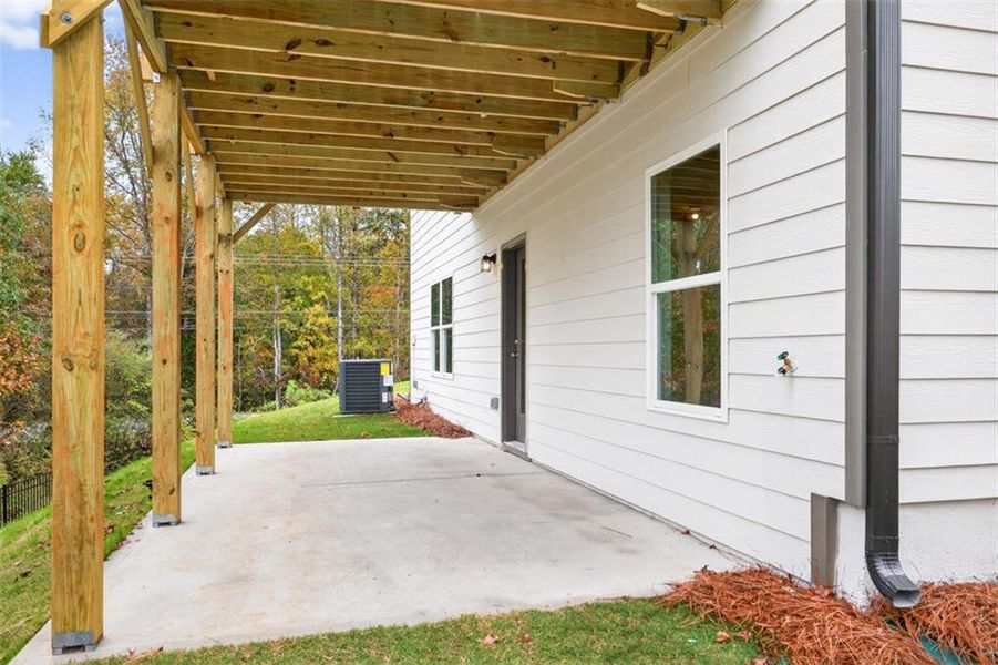 Exterior details and patio area of a home in Garrett Preserve, Douglasville (Image 28).