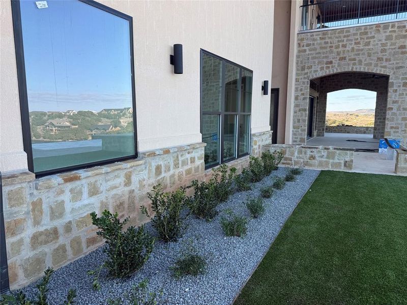View of yard with a patio area View of yard with a patio area