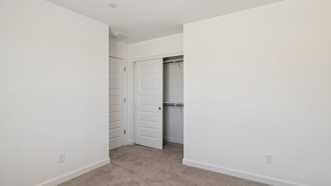 Spacious, unfurnished interior of a new home in The Buttes at Mystic, Peoria (Image 32). Spacious, unfurnished interior of a new home in The Buttes at Mystic, Peoria (Image 32).