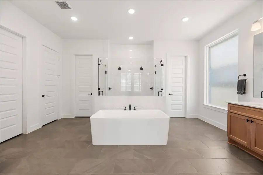 Furnished interior view inside a new home in Bridgeland, Cypress (Image 5).