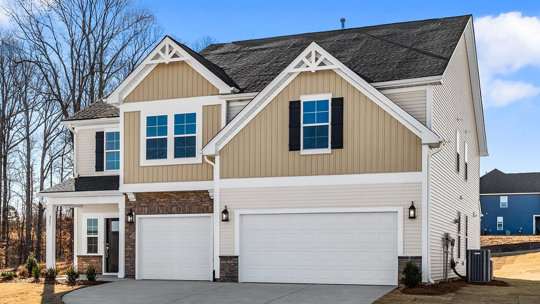 Front exterior of a new home in Fieldstone, Lexington, NC, highlighting curb appeal (Image 23).