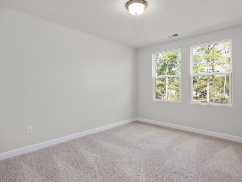 Spacious, unfurnished interior of a new home in Springvale, Fuquay Varina (Image 28).