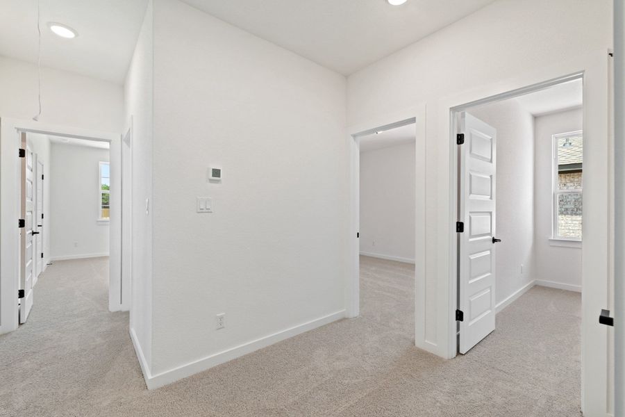 Spacious, unfurnished interior of a new home in Heritage, Dripping Springs (Image 49).