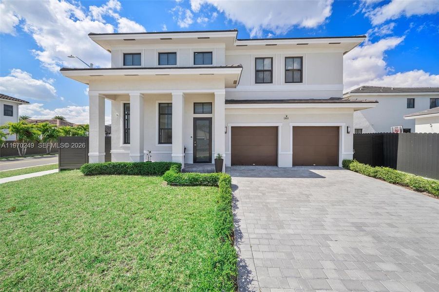 Front exterior of a new home in , Miami, FL, highlighting curb appeal (Image 26).