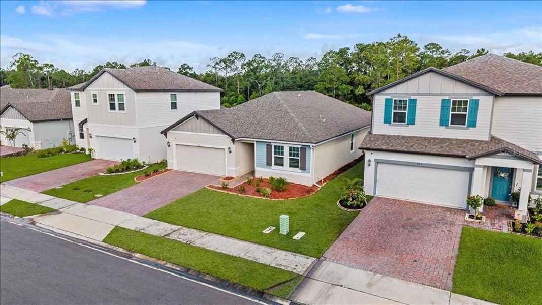 Front exterior of a new home in , Daytona Beach, FL, highlighting curb appeal (Image 25). Front exterior of a new home in , Daytona Beach, FL, highlighting curb appeal (Image 25).