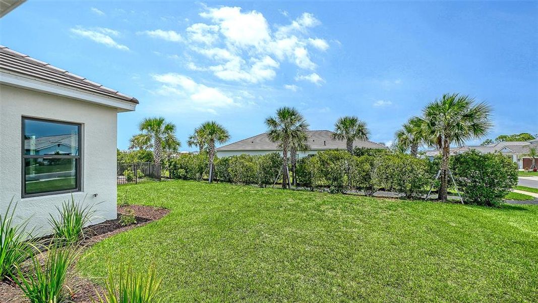 Exterior details and patio area of a home in Grand Park, Sarasota (Image 23). Exterior details and patio area of a home in Grand Park, Sarasota (Image 23).