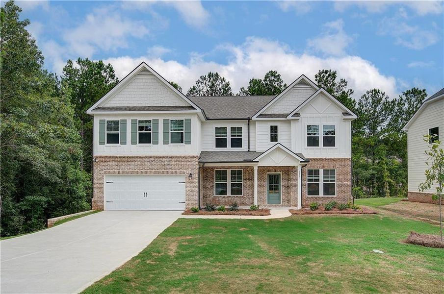 Front exterior of a new home in Kingston, Locust Grove, GA, highlighting curb appeal (Image 2). Front exterior of a new home in Kingston, Locust Grove, GA, highlighting curb appeal (Image 2).