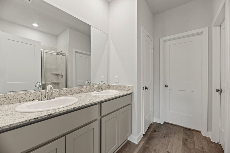 A bathroom with a marble countertop. A bathroom with a marble countertop.