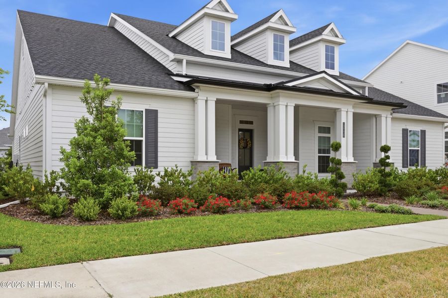 Front exterior of a new home in Seven Pines 70' Rear Entry, Jacksonville, FL, highlighting curb appeal (Image 27).