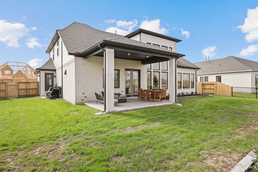 Exterior details and patio area of a home in Fulbrook on Fulshear Creek 60', Fulshear (Image 26).