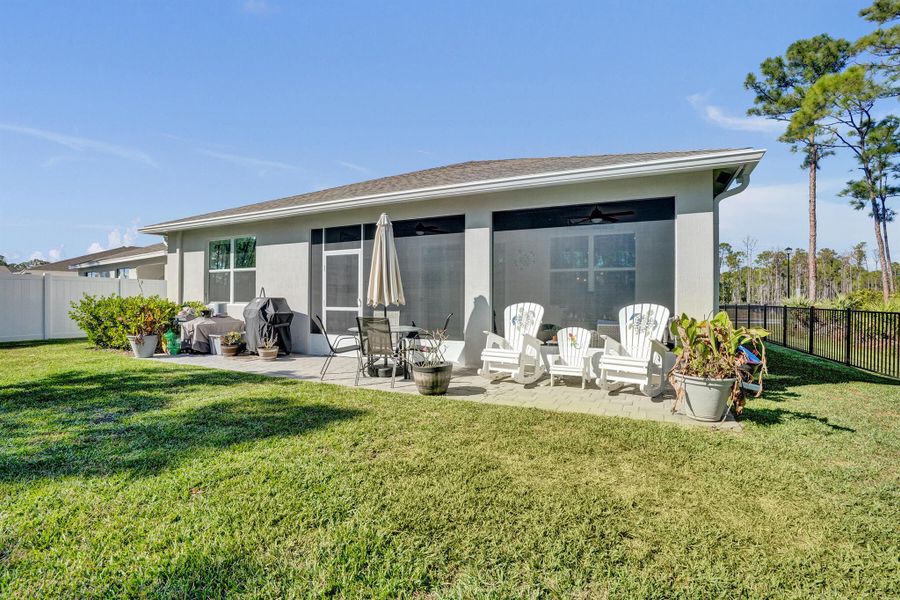 Exterior details and patio area of a home in Preserves at Park Trace, Stuart (Image 25).