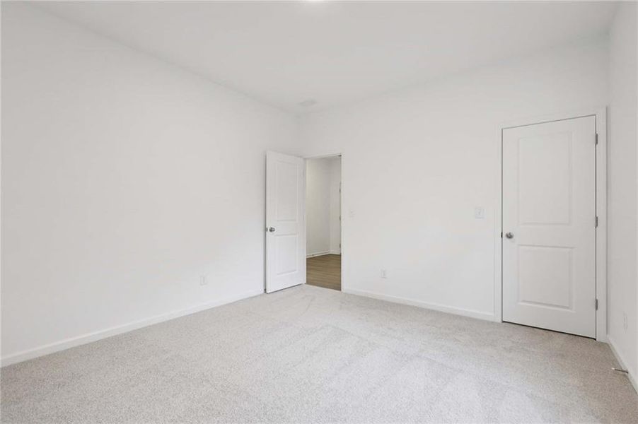 Spacious, unfurnished interior of a new home in The Pointe at Heron Bay, Locust Grove (Image 23).