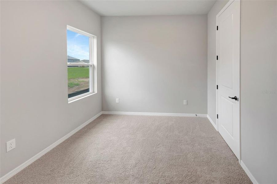 Spacious, unfurnished interior of a new home in Waterset Tradition Series, Apollo Beach (Image 11).