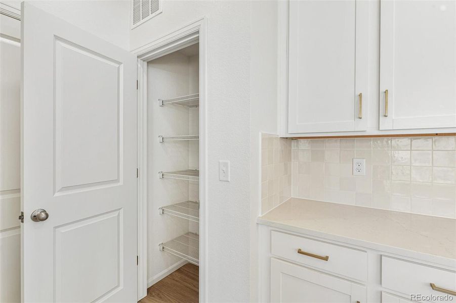 Furnished interior view inside a new home in Turnberry Villas, Commerce City (Image 8).