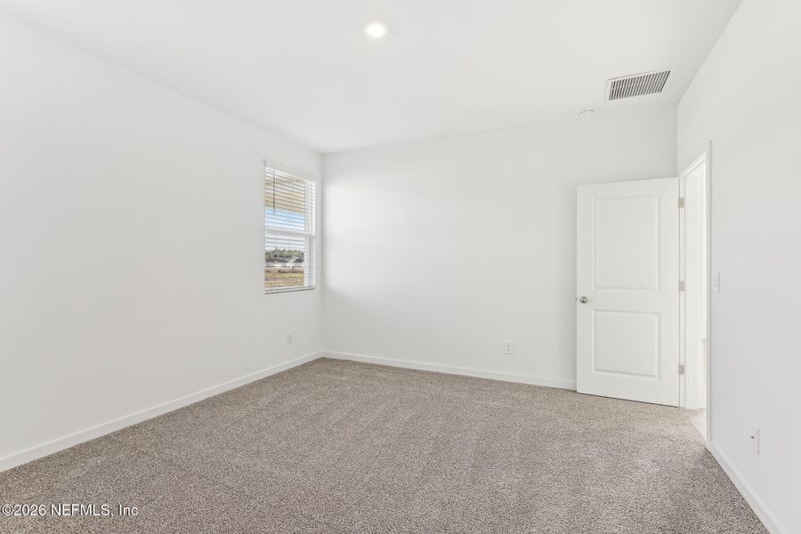 Spacious, unfurnished interior of a new home in Lakes at Bella Lago - Signature Series, Green Cove Springs (Image 24). Spacious, unfurnished interior of a new home in Lakes at Bella Lago - Signature Series, Green Cove Springs (Image 24).