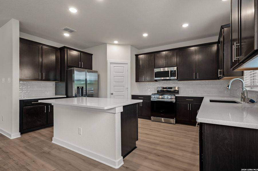 Furnished interior view inside a new home in Trilogy Grove, San Antonio (Image 5).