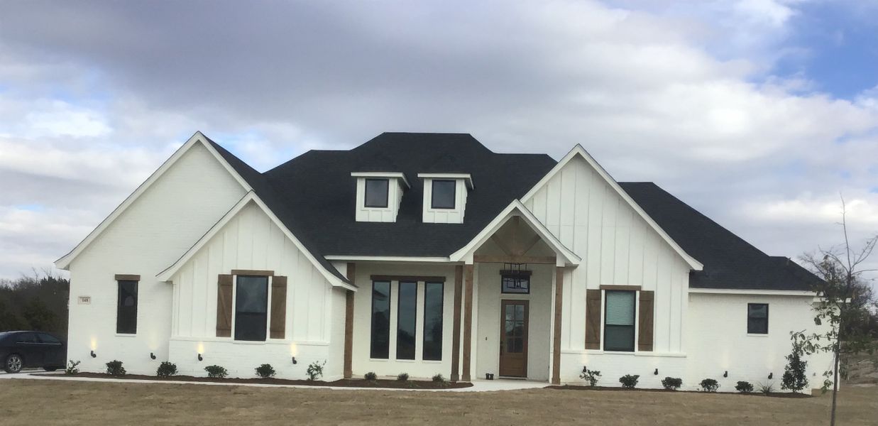 Representative exterior photo of a completed home built from the 076-2602-0518 by Abba River Homes in Stanford Estates, Springtown, TX (Image 2). Representative exterior photo of a completed home built from the 076-2602-0518 by Abba River Homes in Stanford Estates, Springtown, TX (Image 2).