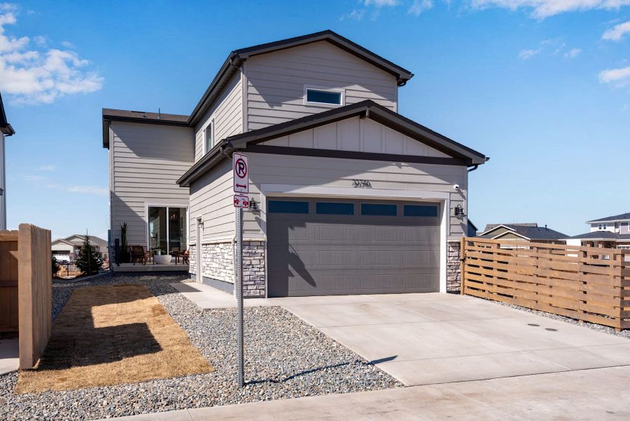 Representative exterior photo of a completed home built from the 2803 by Tri Pointe Homes in Painted Prairie, Aurora, CO (Image 21).