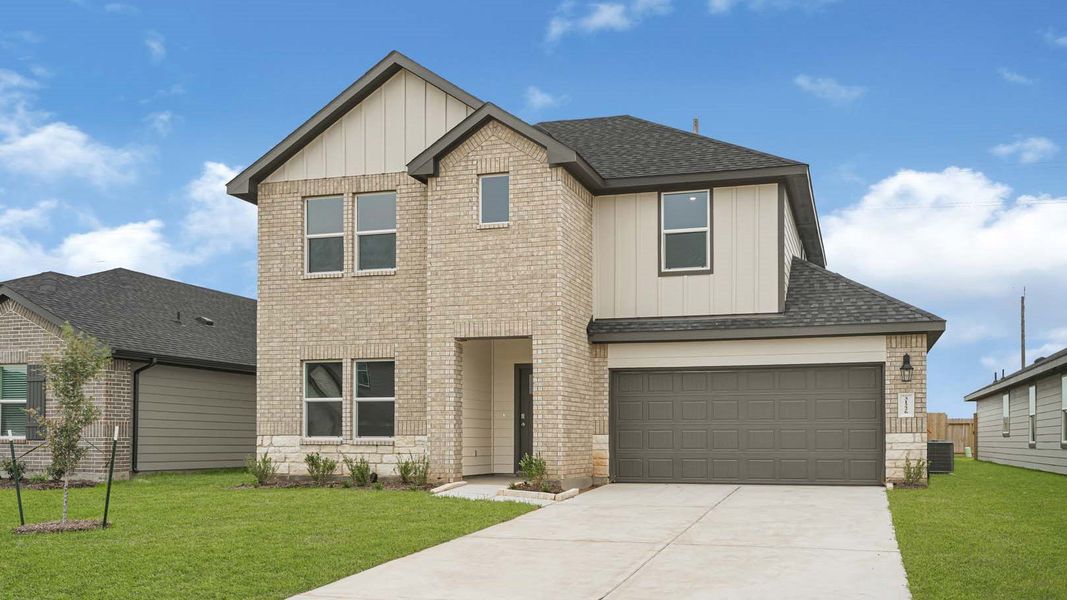 Front exterior of a new home in Tamarron, Fulshear, TX, highlighting curb appeal (Image 1). Front exterior of a new home in Tamarron, Fulshear, TX, highlighting curb appeal (Image 1).