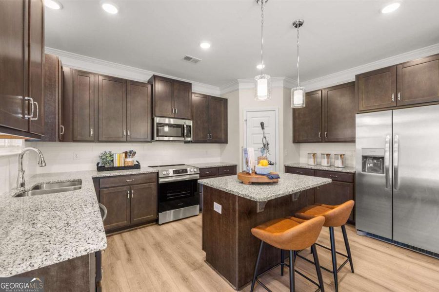 Furnished interior view inside a new home in Maddox Station, Eatonton (Image 8).