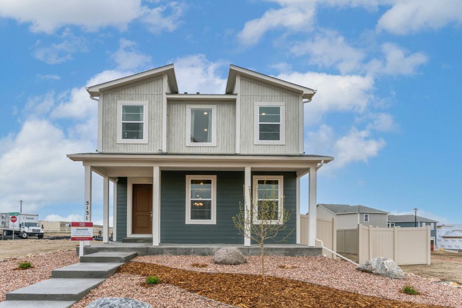 Front exterior of a new home in The Trails at Aspen Ridge – Altitude Collection, Colorado Springs, CO, highlighting curb appeal (Image 1). Front exterior of a new home in The Trails at Aspen Ridge – Altitude Collection, Colorado Springs, CO, highlighting curb appeal (Image 1).