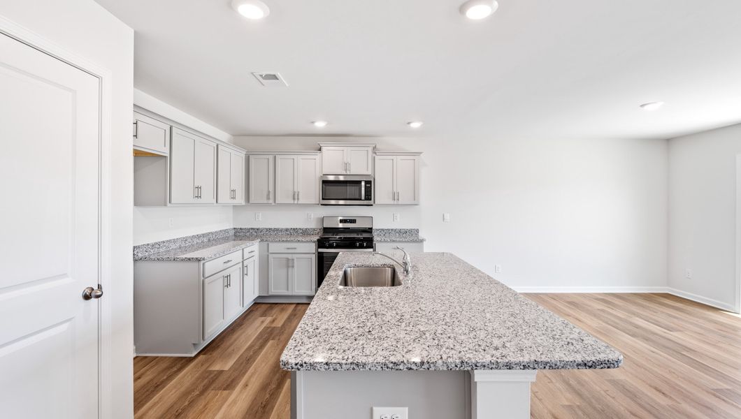 Furnished interior view inside a new home in Stone Creek, Clinton (Image 7).