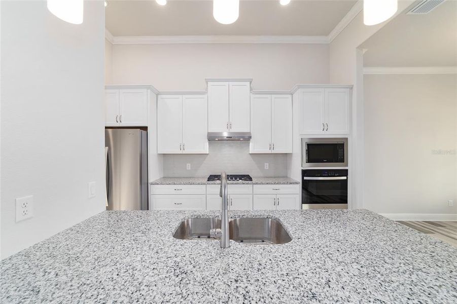 Furnished interior view inside a new home in , Inverness (Image 11).