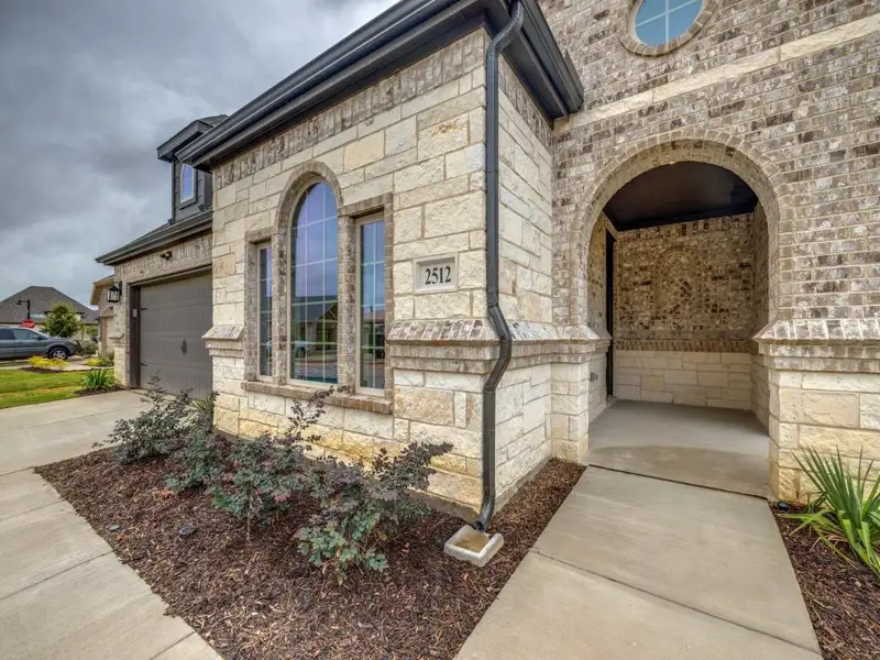 Exterior details and patio area of a home in Ladera at the Reserve, Mansfield (Image 3).