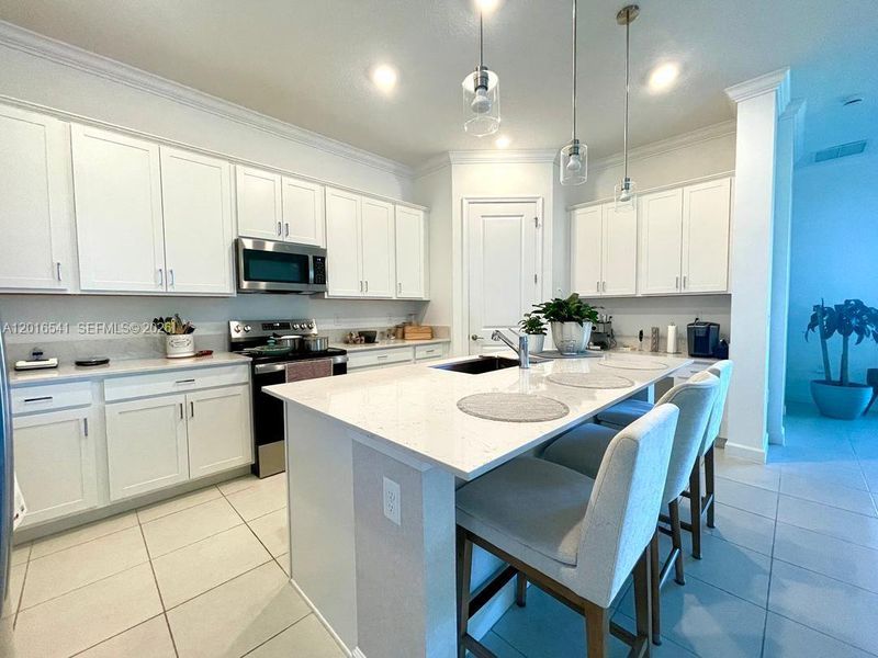 Furnished interior view inside a new home in , Port St. Lucie (Image 10).