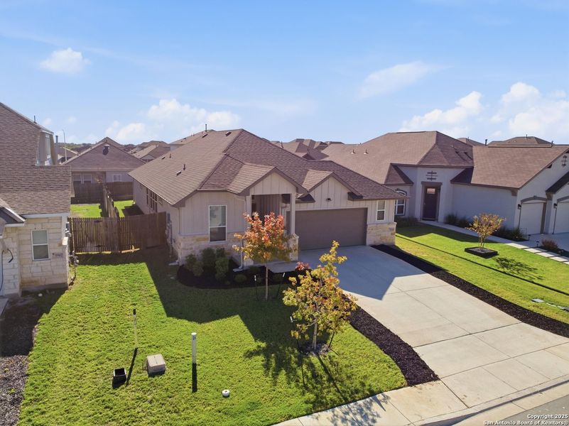 Front exterior of a new home in August Fields, New Braunfels, TX, highlighting curb appeal (Image 1). Front exterior of a new home in August Fields, New Braunfels, TX, highlighting curb appeal (Image 1).