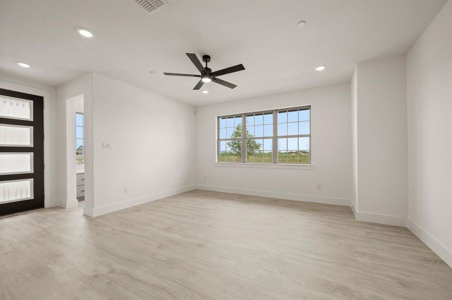 You'll find a light filled family room that the entire family will enjoy in our Camille II
 plan!