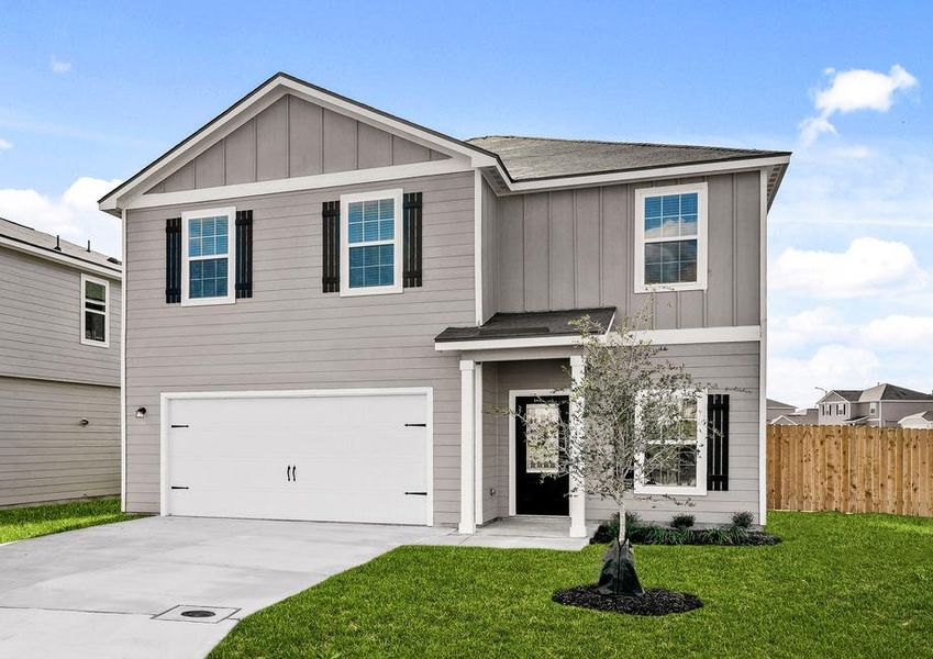 The two-story Rio with front yard landscaping.