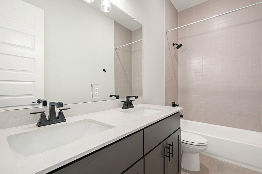 Furnished interior view inside a new home in Arbor Collection at Heritage, Dripping Springs (Image 39).