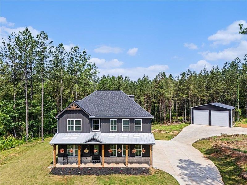 Front exterior of a new home in , Monticello, GA, highlighting curb appeal (Image 24). Front exterior of a new home in , Monticello, GA, highlighting curb appeal (Image 24).