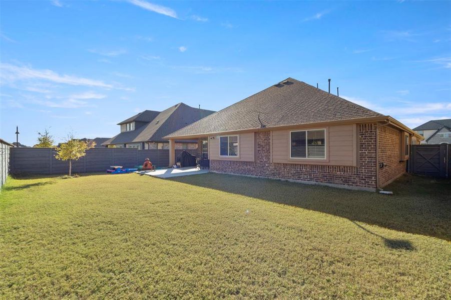 Exterior details and patio area of a home in Union Park Classic 60, Little Elm (Image 3).
