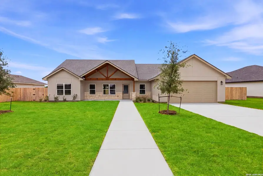 Front exterior of a new home in , Hondo, TX, highlighting curb appeal (Image 1). Front exterior of a new home in , Hondo, TX, highlighting curb appeal (Image 1).