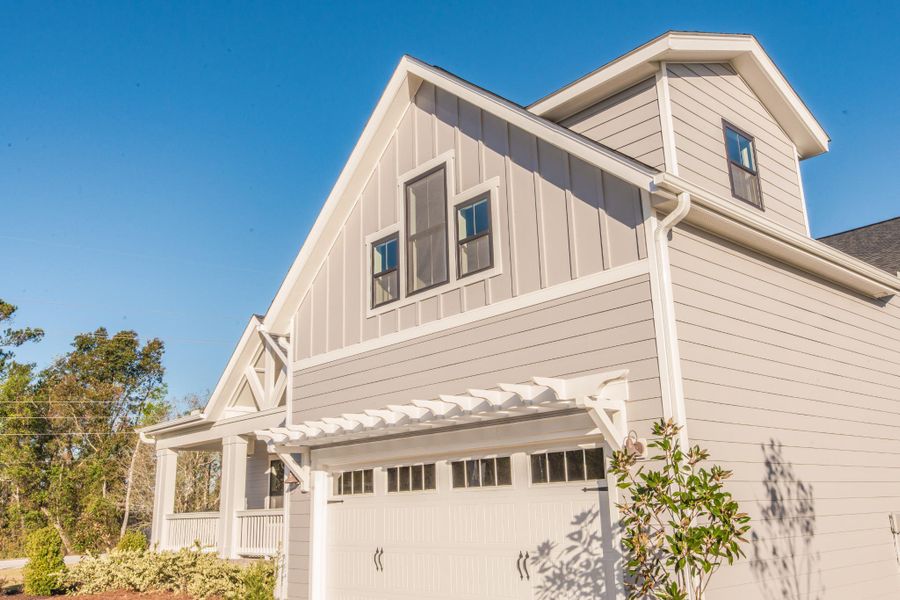 Representative exterior photo of a completed home built from the Sullivan by Bill Clark Homes in Osprey Landing, Southport, NC (Image 23). Representative exterior photo of a completed home built from the Sullivan by Bill Clark Homes in Osprey Landing, Southport, NC (Image 23).