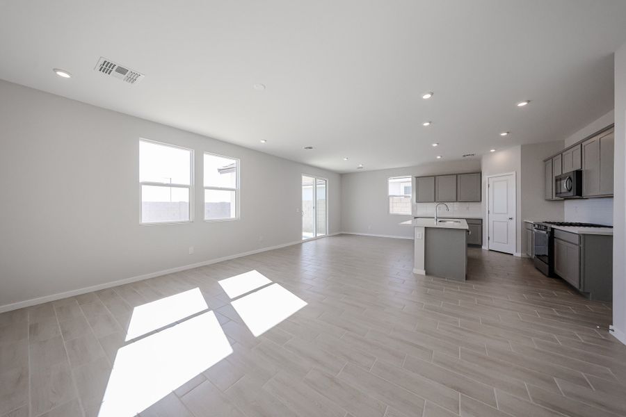 A large empty kitchen. A large empty kitchen.