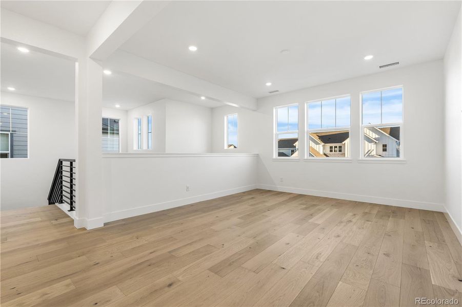 Spacious, unfurnished interior of a new home in Luxe at The Canyons, Castle Pines (Image 37).