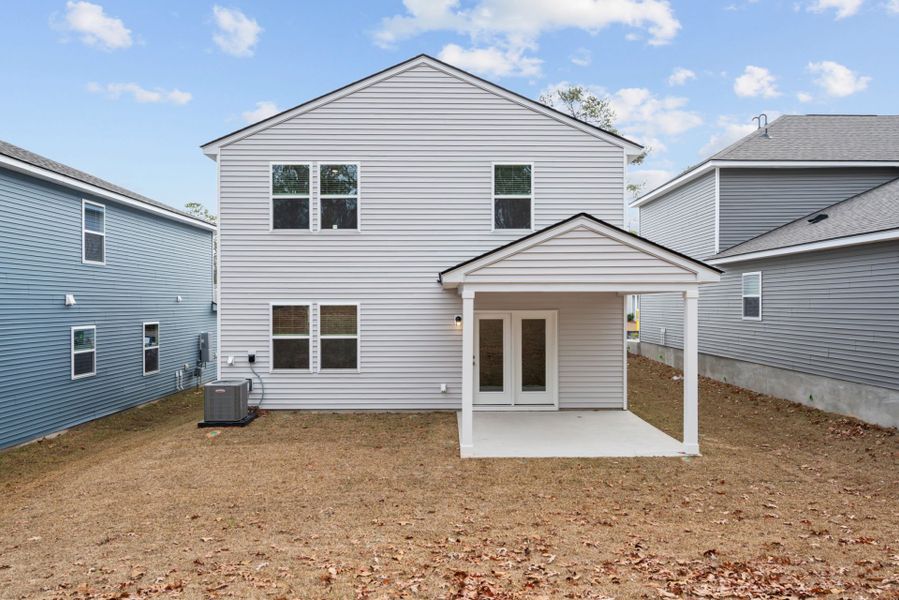 Exterior details and patio area of a home in Grand Arbor, Blythewood (Image 3).
