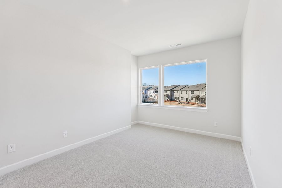 Representative unfurnished interior of a home built from the Onslow by Tri Pointe Homes in The Grove at Latta Park, Durham (Image 11).