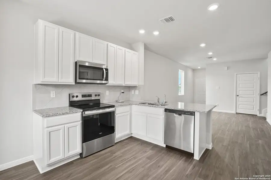 Furnished interior view inside a new home in Melissa Ranch, San Antonio (Image 9). Furnished interior view inside a new home in Melissa Ranch, San Antonio (Image 9).
